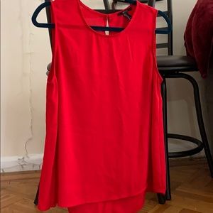 Red sleeveless blouse